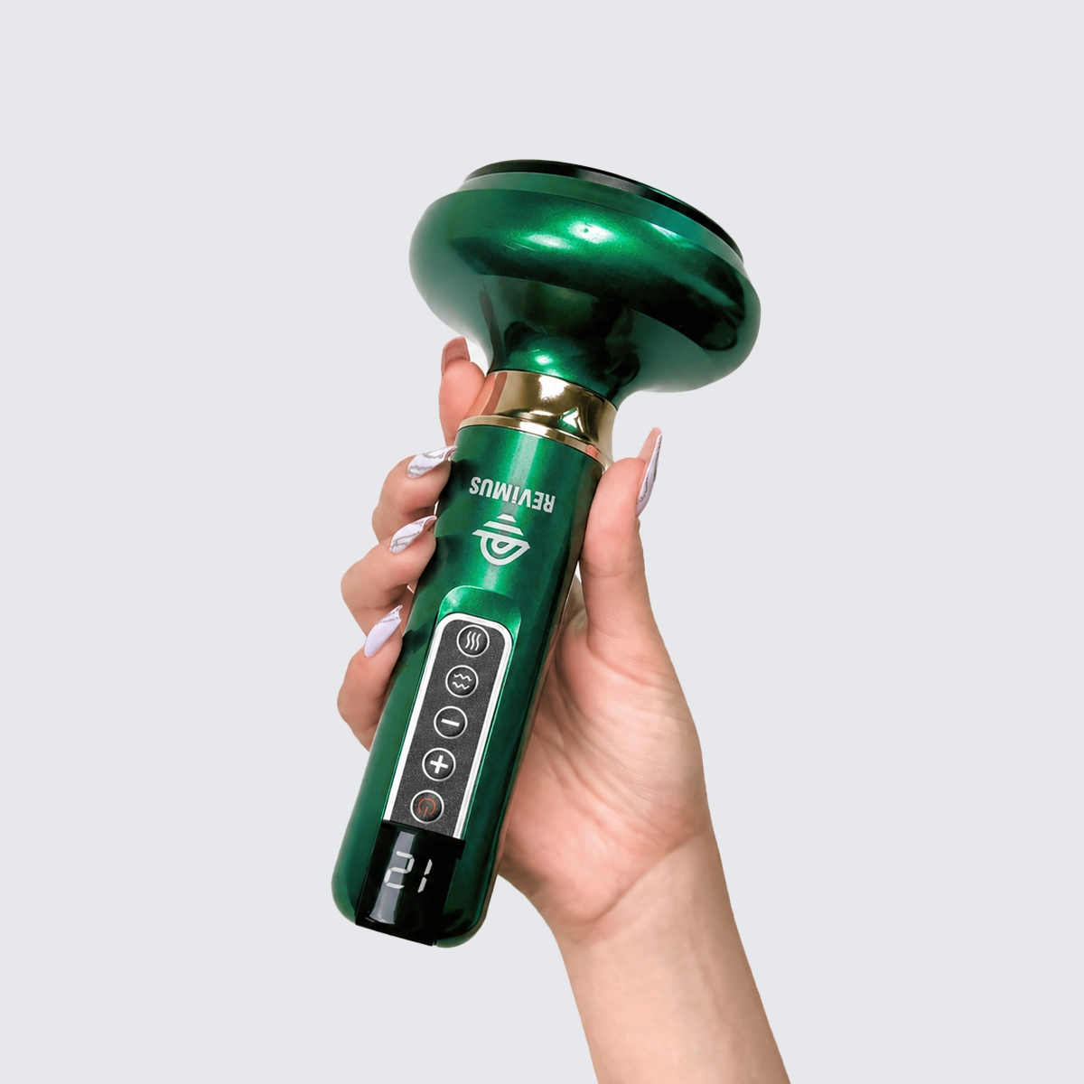 Hand holding the green Revimus Anti-Cellulite Massager
