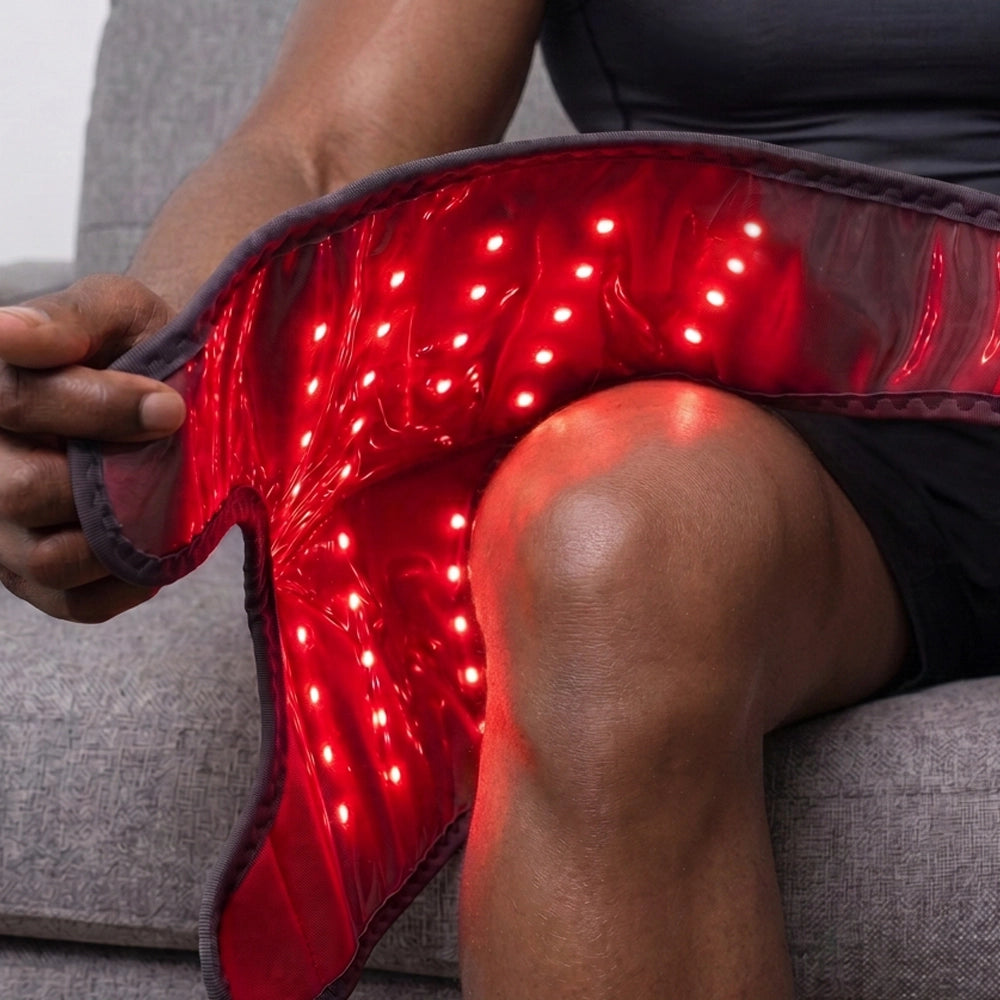 Revimus Motion red light therapy knee massager delivering targeted light therapy around the knee